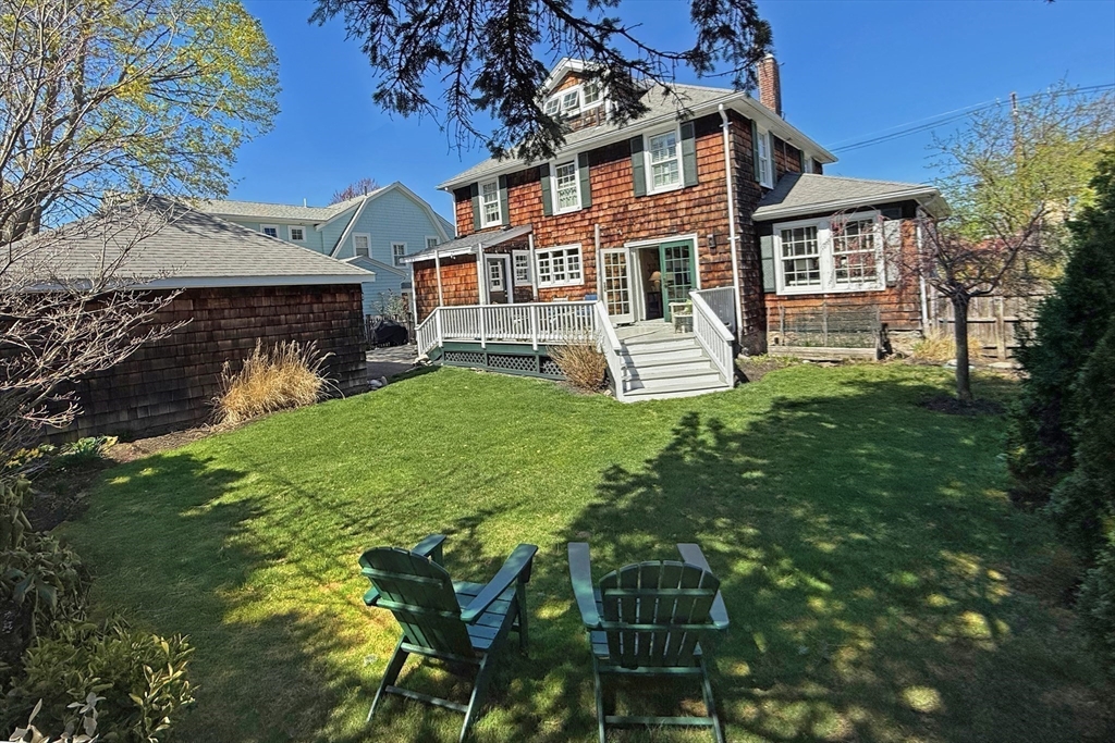 16 Pickwick Road Marblehead, MA 01945 - Photo 27 of 30 a view of a house with a yard and sitting area