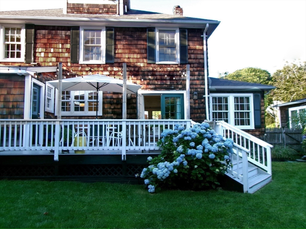 16 Pickwick Road Marblehead, MA 01945 - Photo 29 of 30 a view of a house with a deck and a yard