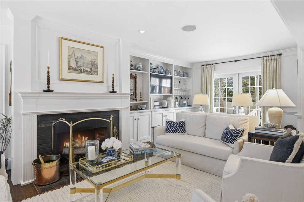 16 Pickwick Road Marblehead, MA 01945 - Photo 5 of 30 a living room with furniture and a fireplace