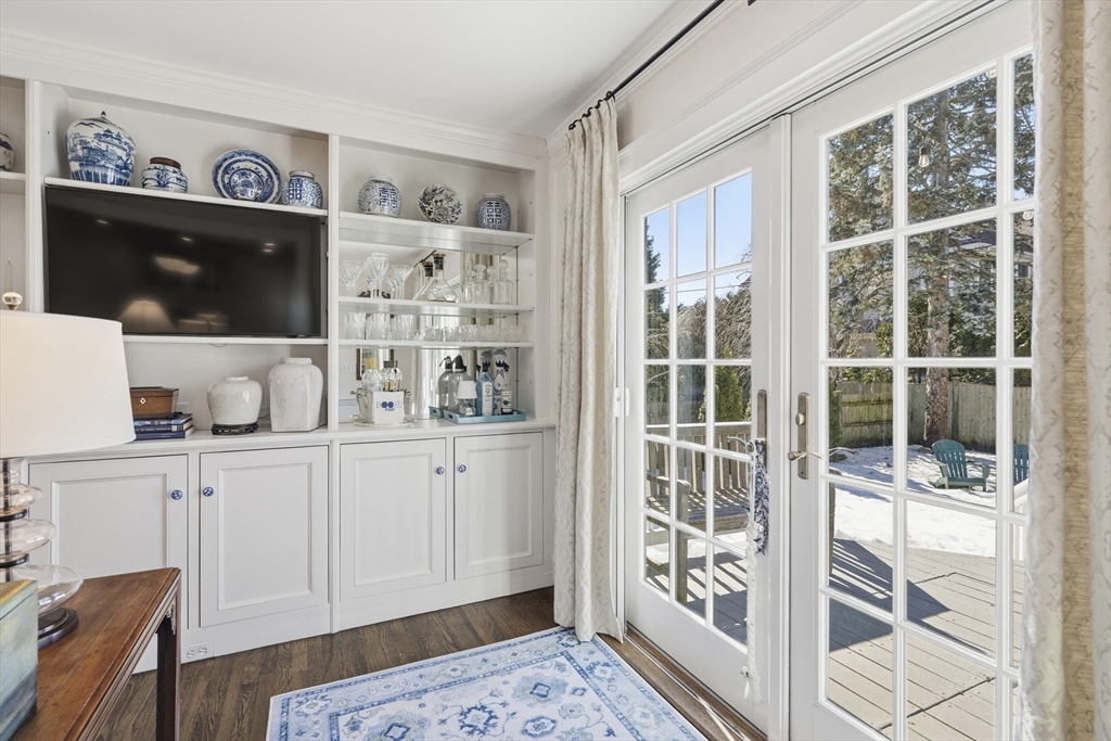 16 Pickwick Road Marblehead, MA 01945 - Photo 6 of 30 a living room with furniture a flat screen tv and a window