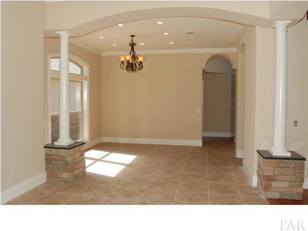6640 Codell Street Navarre, FL 32566 - Photo 22 of 22 OPEN FLOOR PLAN FEATURES TILE AND BEAUTIFUL HARDWOOD FLOORING THROUGHOUT THE HOUSE WITH CARPET IN ALL BEDROOMS.
