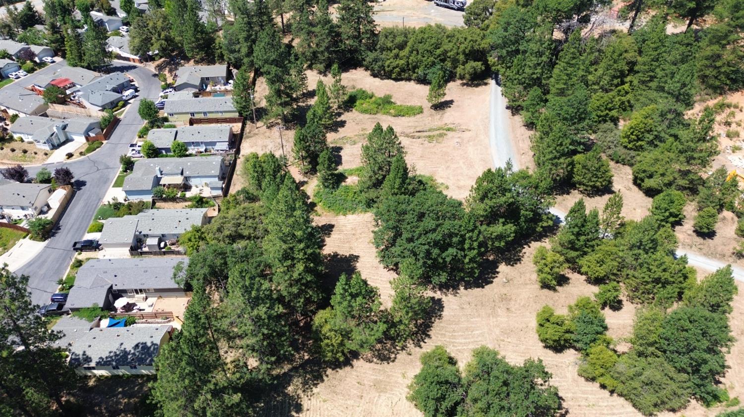 0 Whitcomb Avenue Colfax, CA 95713 - Photo 8 of 32 an aerial view of residential houses with outdoor space and trees all around