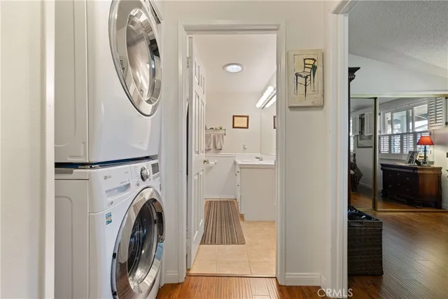 a kitchen with stainless steel appliances granite countertop a refrigerator and a stove
