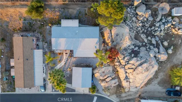 an aerial view of houses with outdoor space
