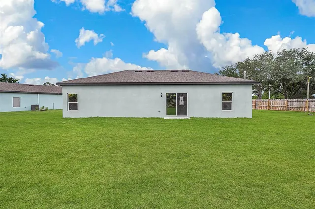 a house view with a garden space