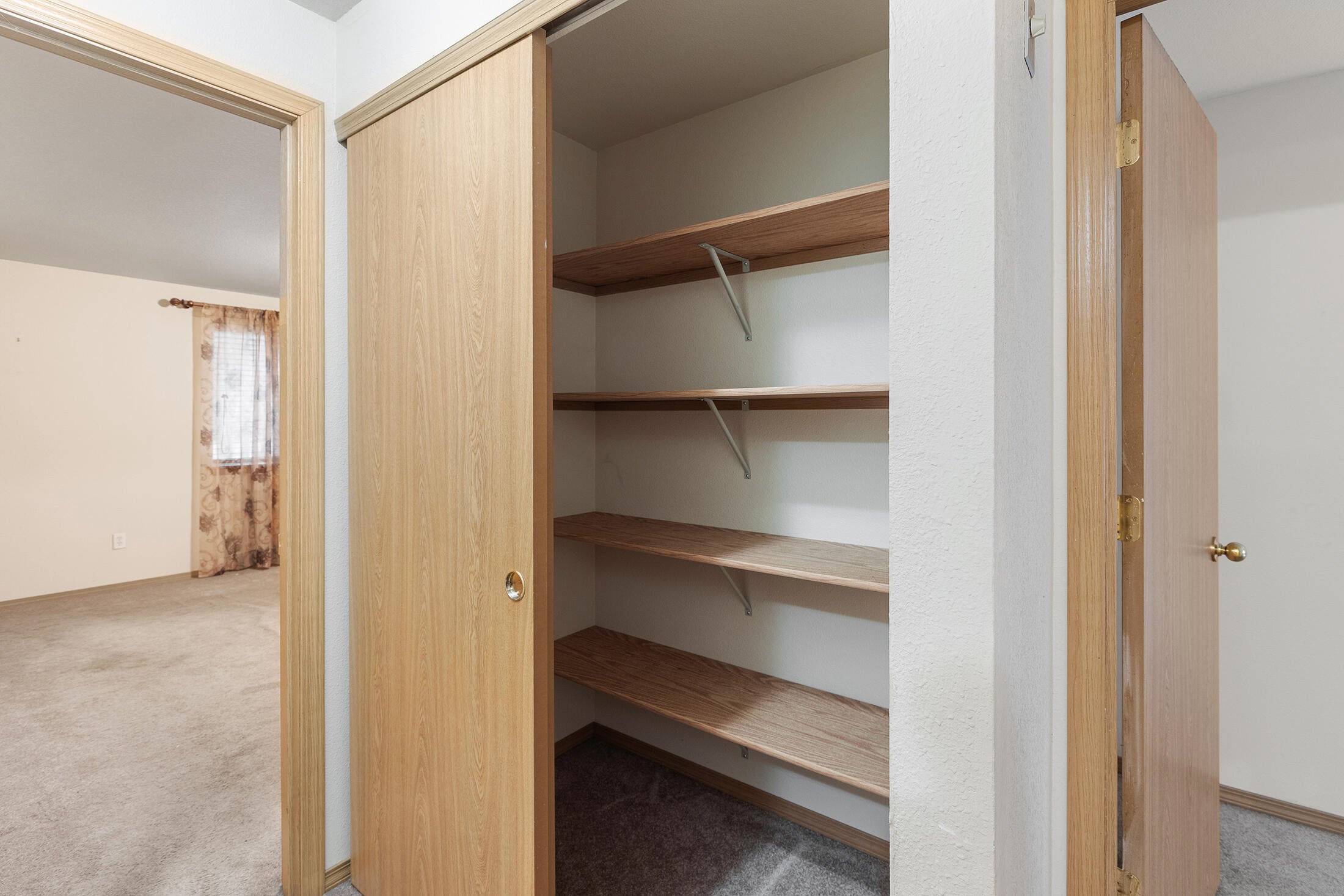 7060 Rockydale Road Cave Junction, OR 97523 - Photo 21 of 33 large linen closet in the hall