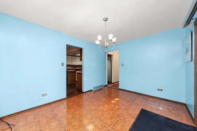 a view of a room with a chandelier