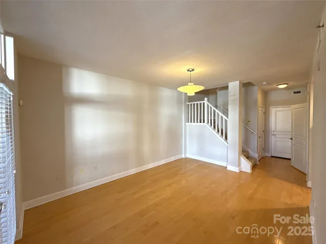 a kitchen that has a sink and a large window