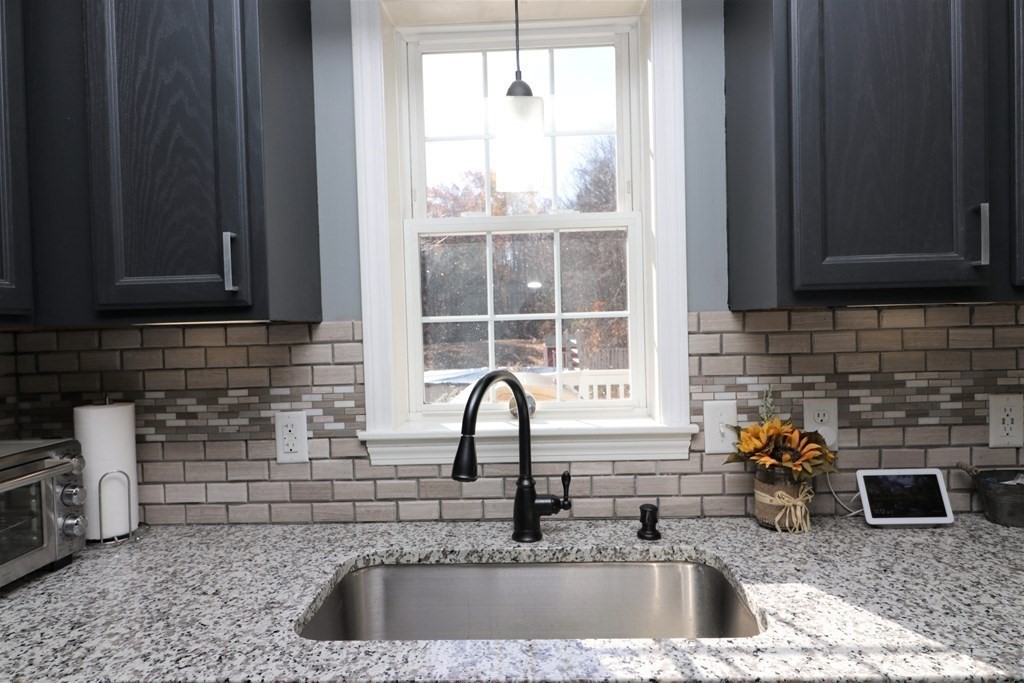 389 County Road Ashby, MA 01431 - Photo 6 of 34 a kitchen with a sink and a window