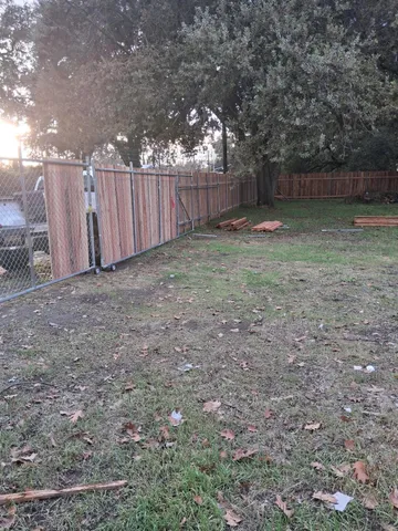 a backyard of a house with lots of green space