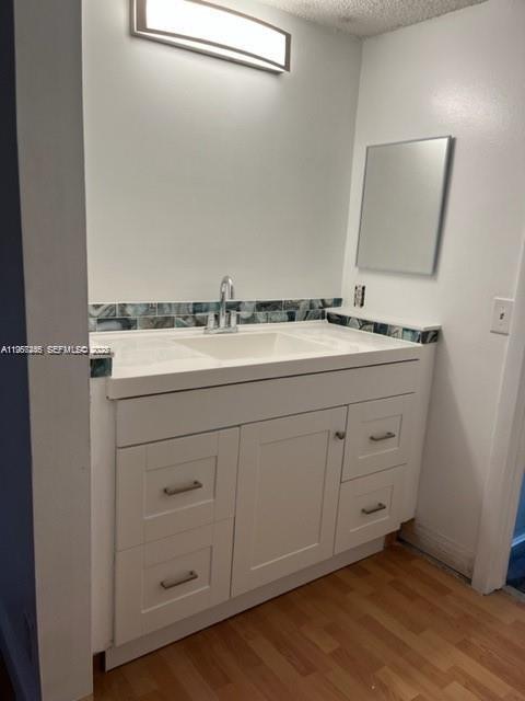 14020 Southwest 90th Terrace, Unit 14020 Miami, FL 33186 - Photo 2 of 13 a utility room with cabinets