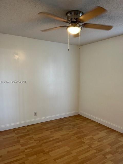 14020 Southwest 90th Terrace, Unit 14020 Miami, FL 33186 - Photo 6 of 13 a view of a room with an empty space
