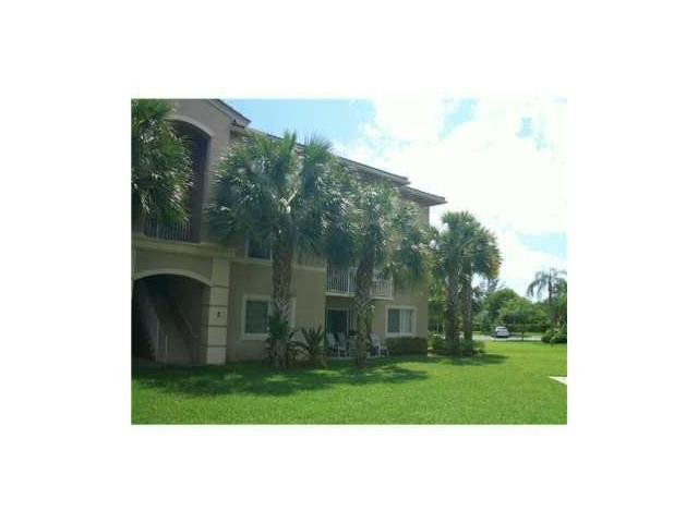 5045 Wiles Road, Unit 104 Pompano Beach, FL 33073 - Photo 2 of 10 Exterior Front