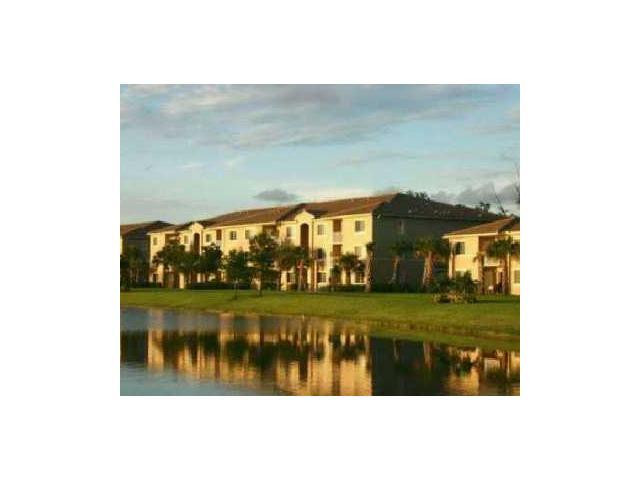 5045 Wiles Road, Unit 104 Pompano Beach, FL 33073 - Photo 4 of 10 Exterior Front