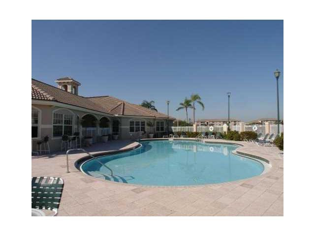5045 Wiles Road, Unit 104 Pompano Beach, FL 33073 - Photo 6 of 10 Exterior Front