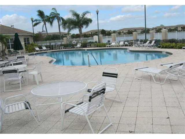 5045 Wiles Road, Unit 104 Pompano Beach, FL 33073 - Photo 7 of 10 Exterior Front