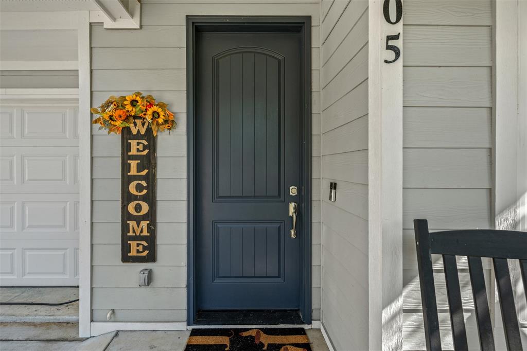 905 Poe Street Azle, TX 76020 - Photo 7 of 30 a front view of a house