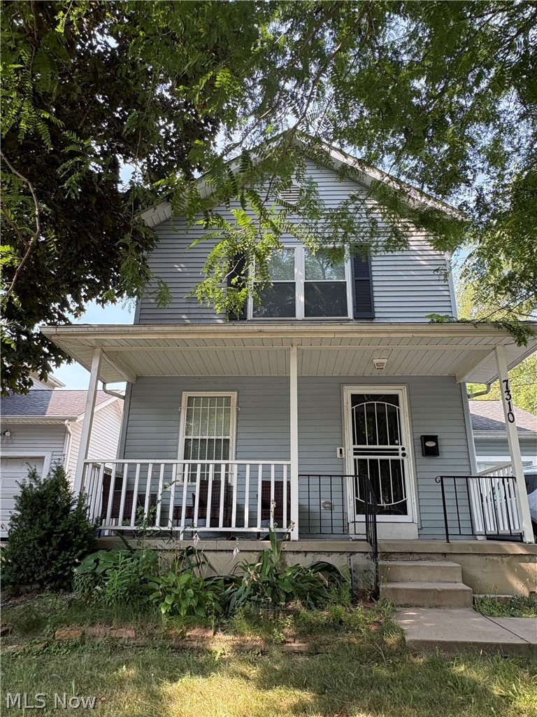 7310 Colfax Road Cleveland, OH 44104 - Photo 1 of 18 Front of house