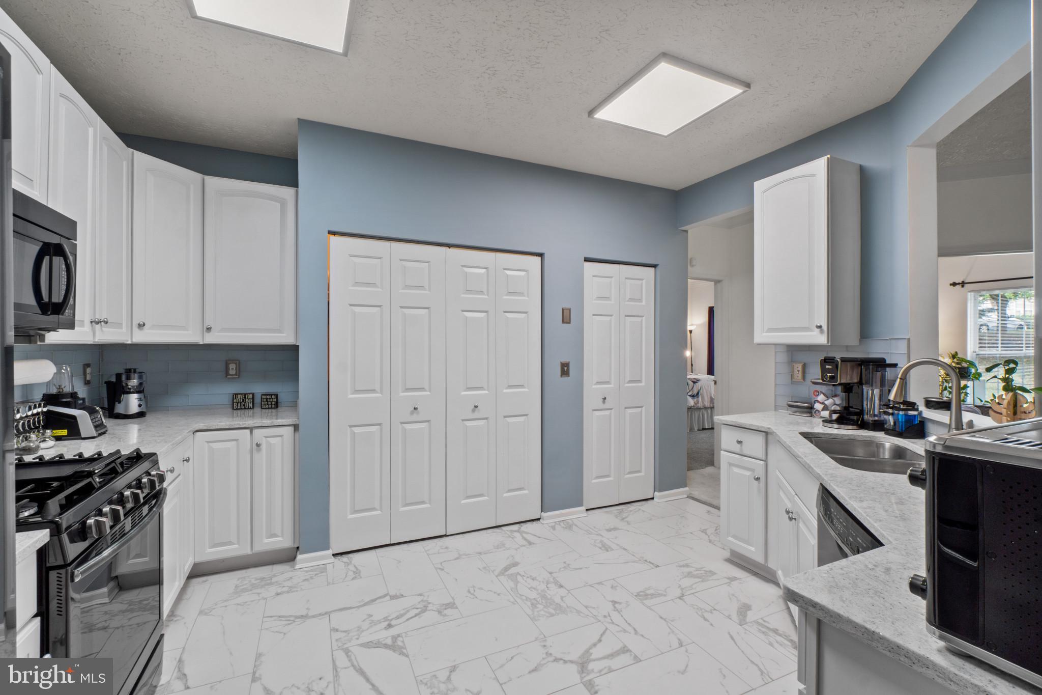 5144 Brightleaf Court, Unit 5144 Rosedale, MD 21237 - Photo 8 of 35 Bright and airy modern kitchen space.