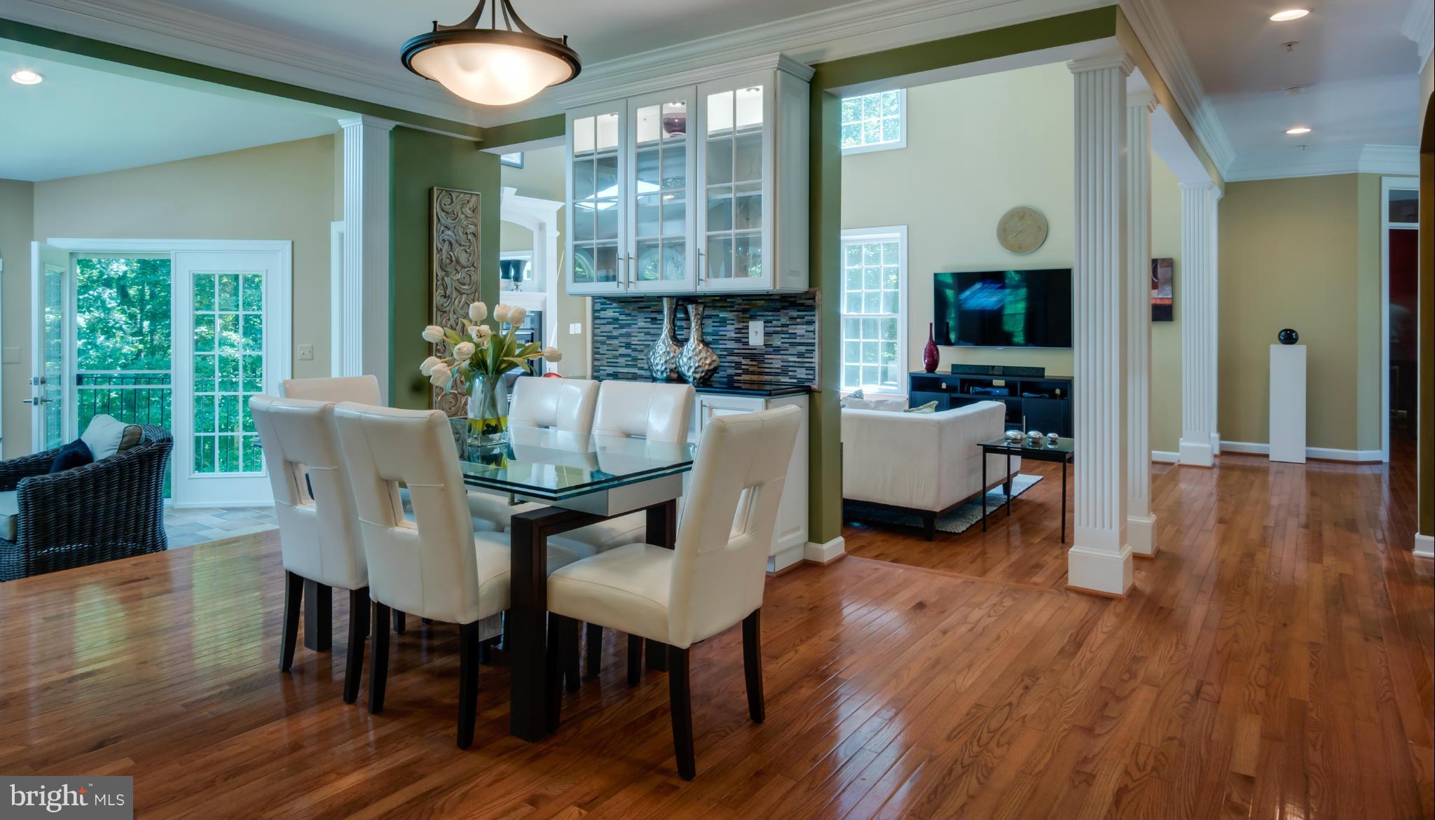 9755 Hawkins Creamery Road Laytonsville, MD 20882 - Photo 8 of 30 a view of a dining room with furniture window and wooden floor