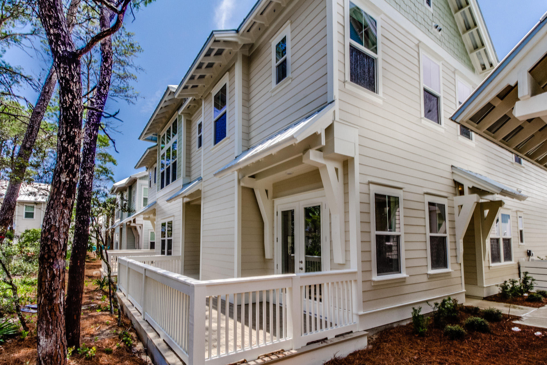 112 Pine Lands Loop Inlet Beach, Unit 524A Inlet Beach, FL 32461 - Photo 2 of 36 a view of a house with a yard