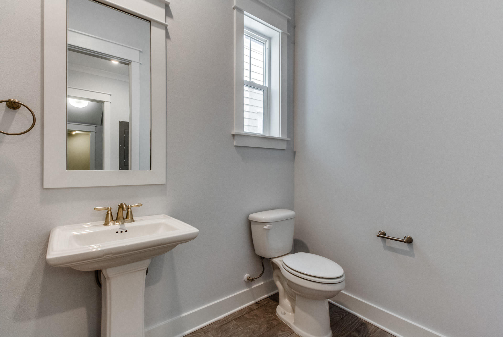 112 Pine Lands Loop Inlet Beach, Unit 524A Inlet Beach, FL 32461 - Photo 13 of 36 a bathroom with a toilet sink and mirror