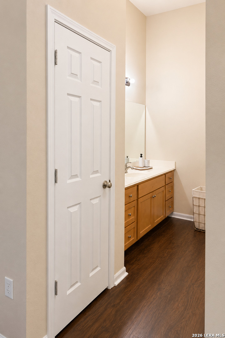 6160 Eckhert Road, Unit 804 San Antonio, TX 78240 - Photo 22 of 38 a view of an empty room with wooden floor