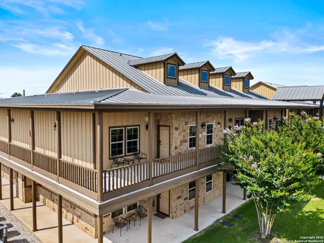 a front view of a house with balcony