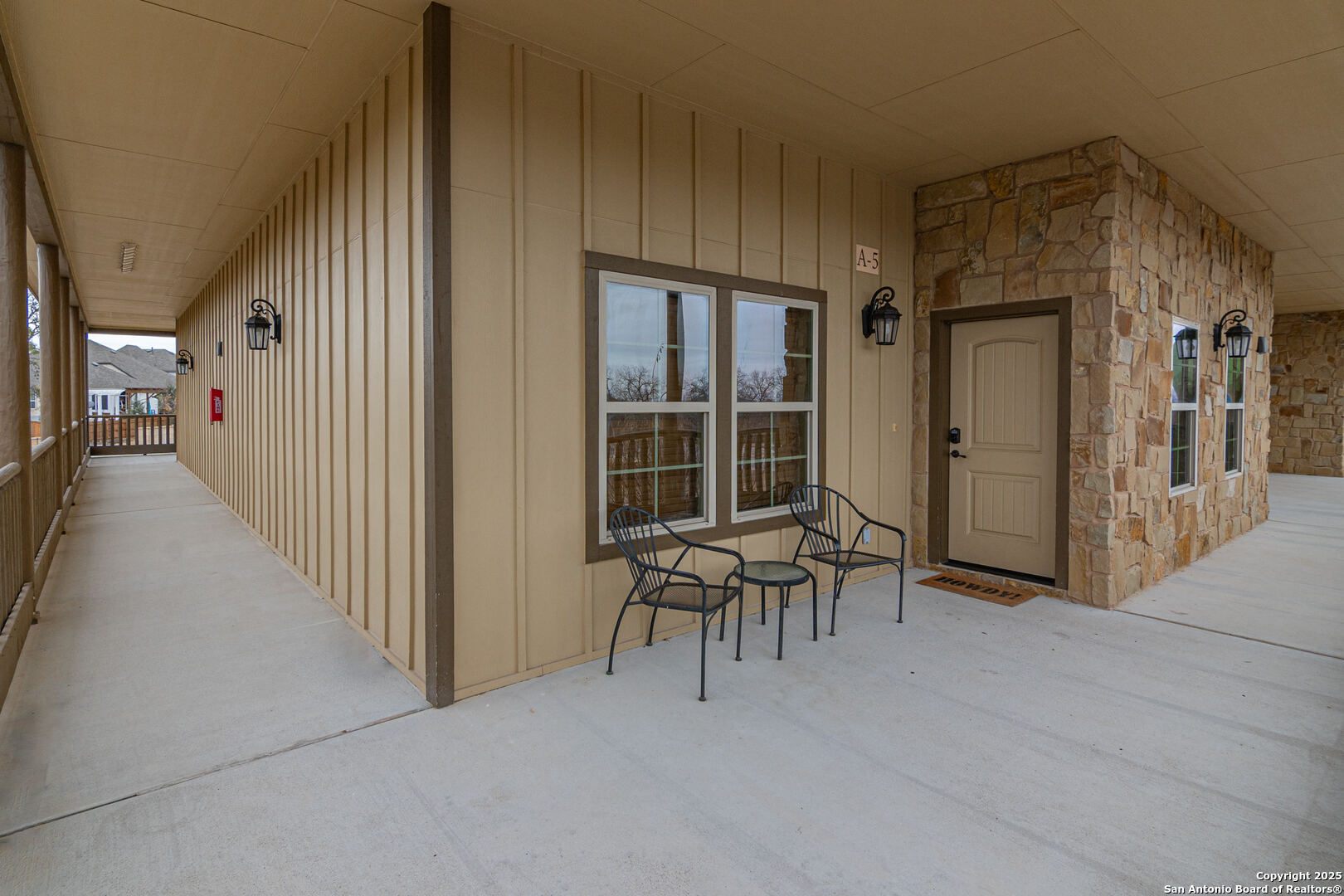 1554 Gruene Road, Unit A5 New Braunfels, TX 78130 - Photo 17 of 22 a view of a porch with seating space