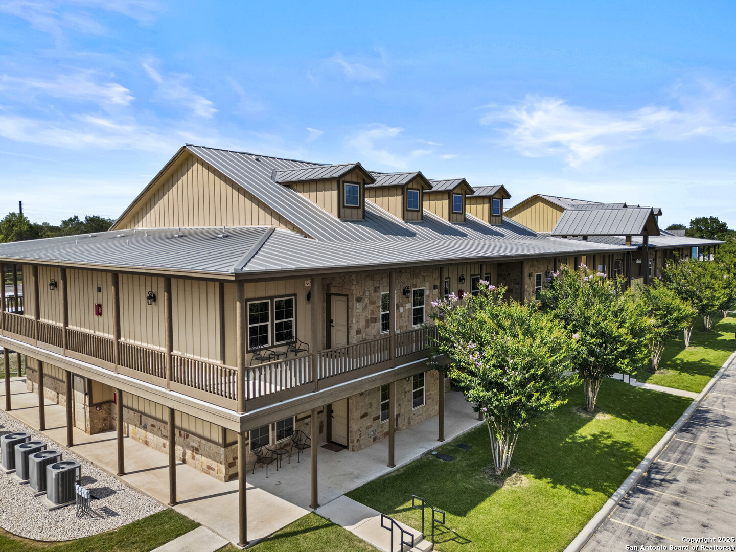 1554 Gruene Road, Unit A5 New Braunfels, TX 78130 - Photo 18 of 22 a front view of a house with garden