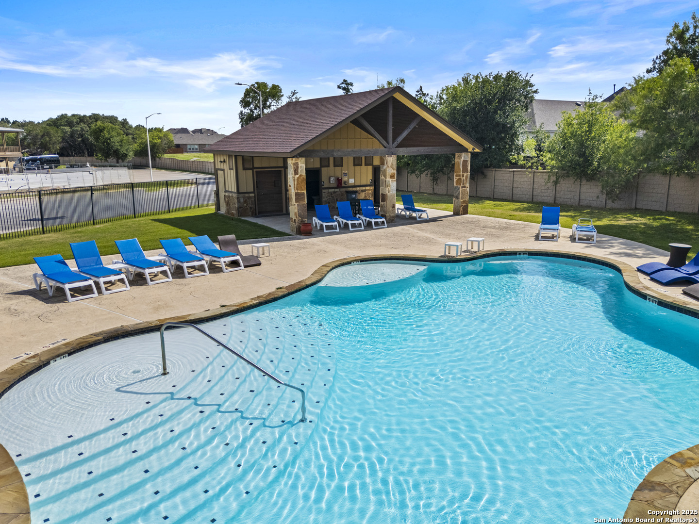 1554 Gruene Road, Unit A5 New Braunfels, TX 78130 - Photo 20 of 22 a view of a house with swimming pool and furniture
