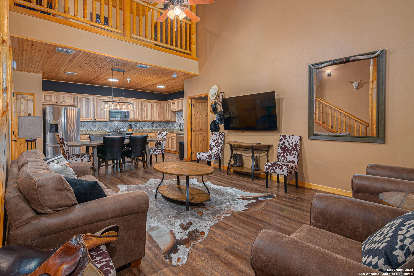 1554 Gruene Road, Unit A5 New Braunfels, TX 78130 - Photo 2 of 22 a living room with furniture and a flat screen tv
