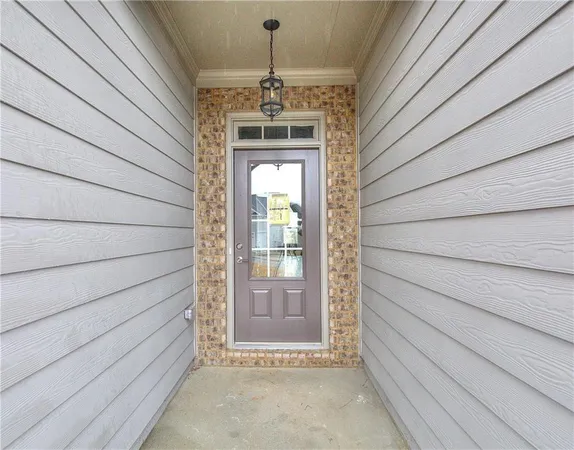 a front view of a house with a porch