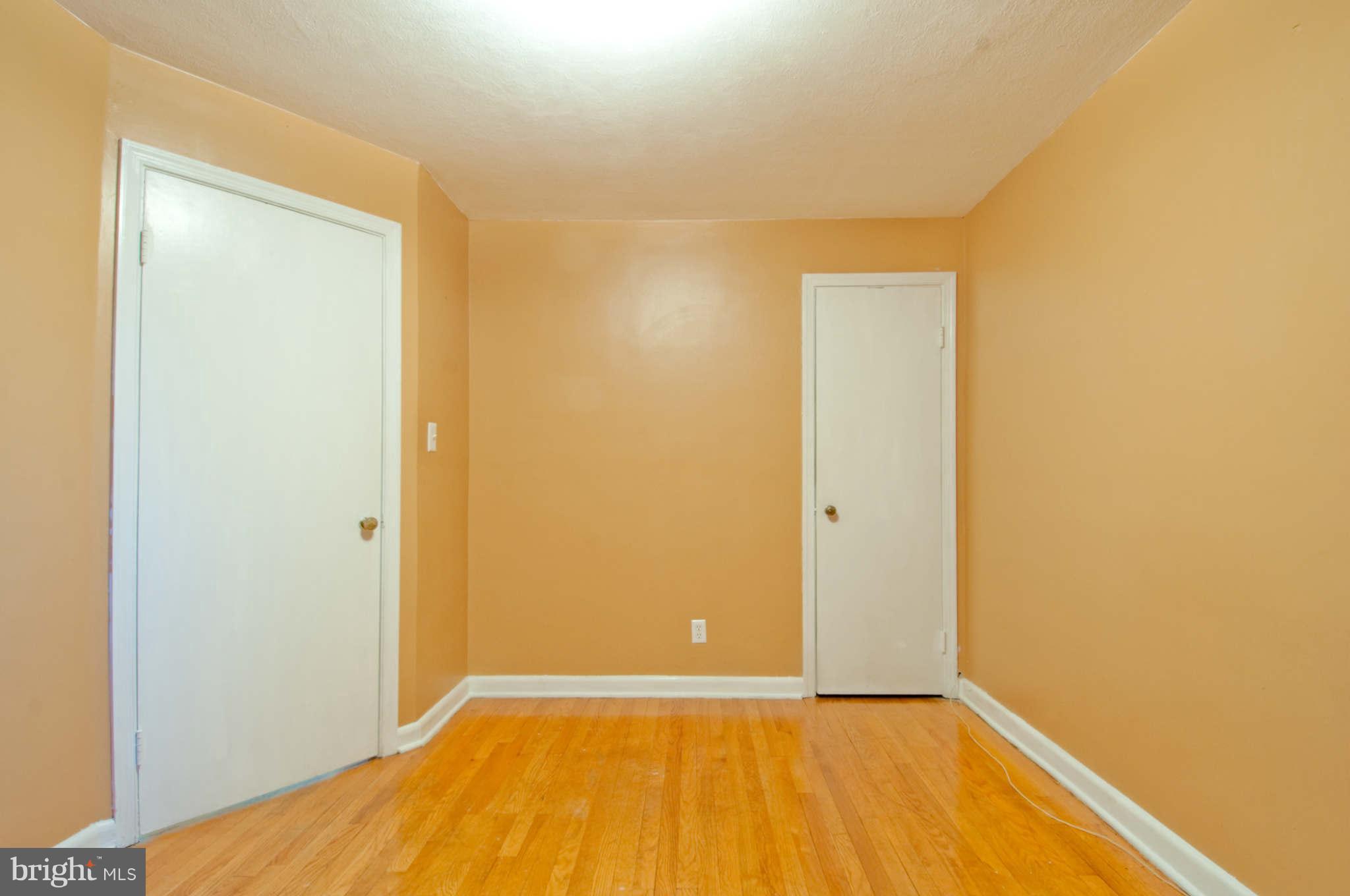422 Westfield Road Baltimore, MD 21222 - Photo 11 of 24 a view of a big room with wooden floor