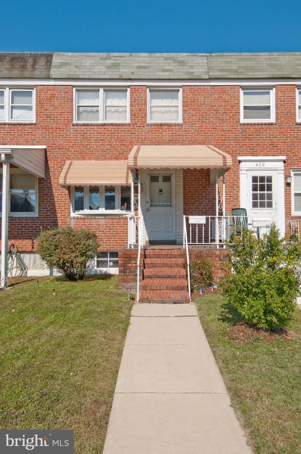 422 Westfield Road Baltimore, MD 21222 - Photo 24 of 24 a front view of a house with garden
