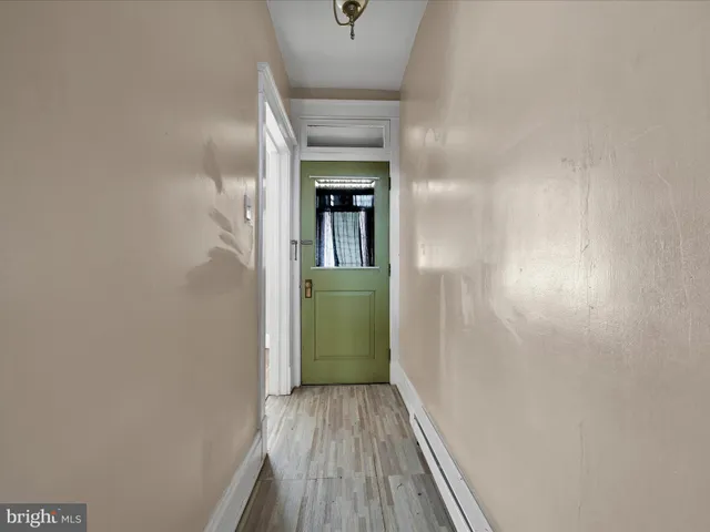 a view of a backyard with seating area