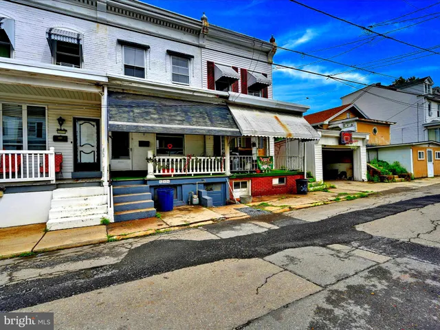 a view of a house with a patio