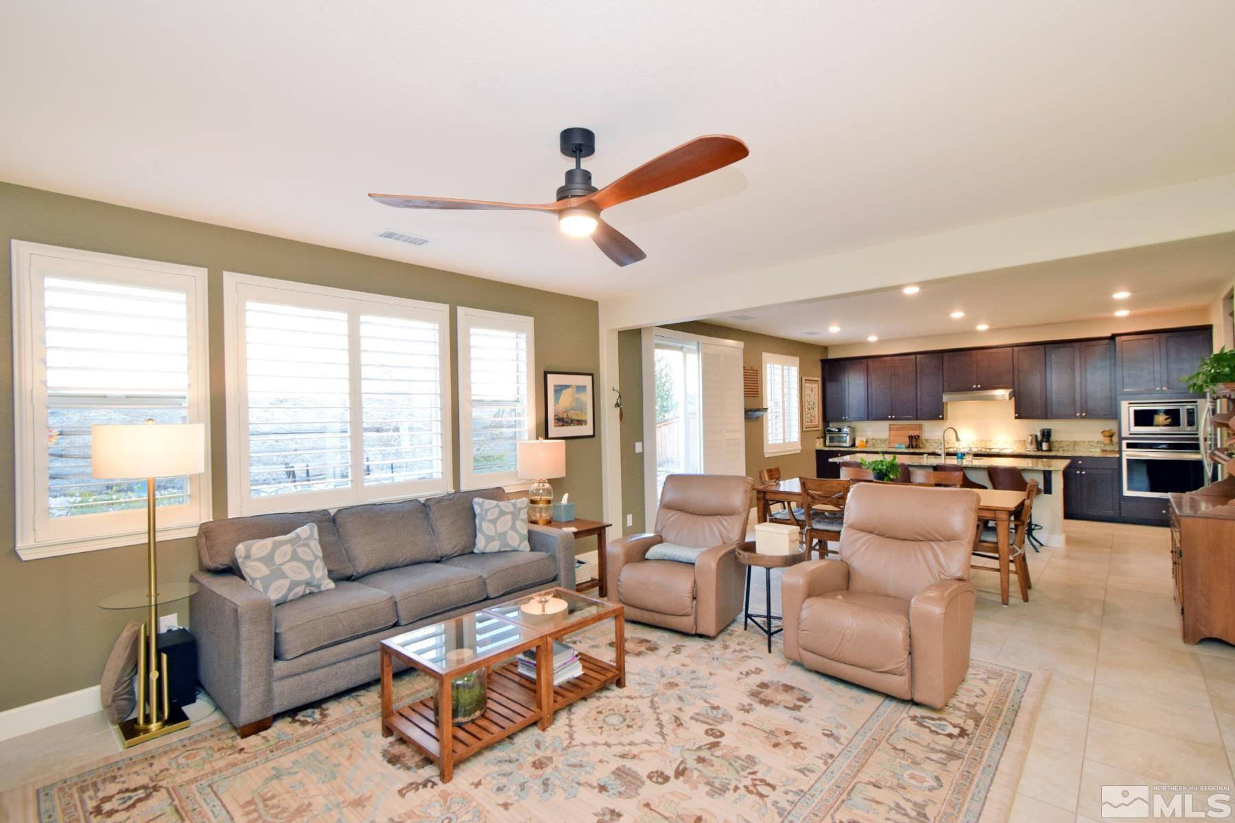 1630 Scott Valley Road Reno, NV 89523 - Photo 12 of 33 a living room with furniture and a large window with kitchen view