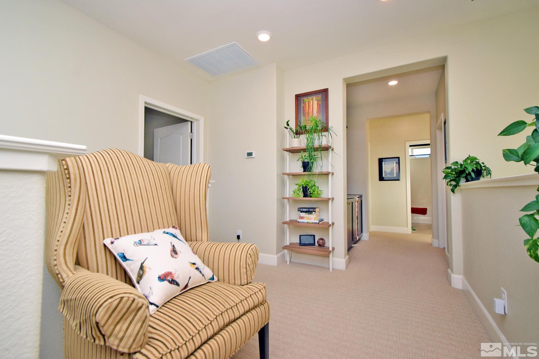 1630 Scott Valley Road Reno, NV 89523 - Photo 14 of 33 a bedroom with a bed and a couch