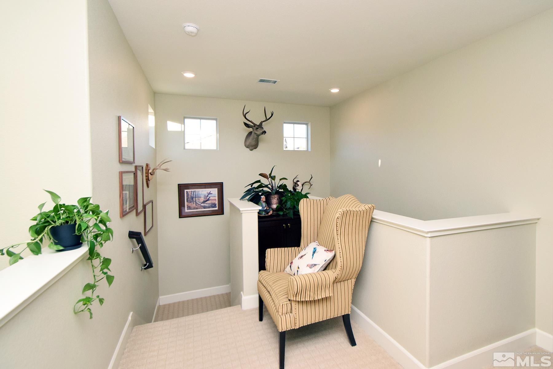 1630 Scott Valley Road Reno, NV 89523 - Photo 15 of 33 a living room with furniture and a potted plant