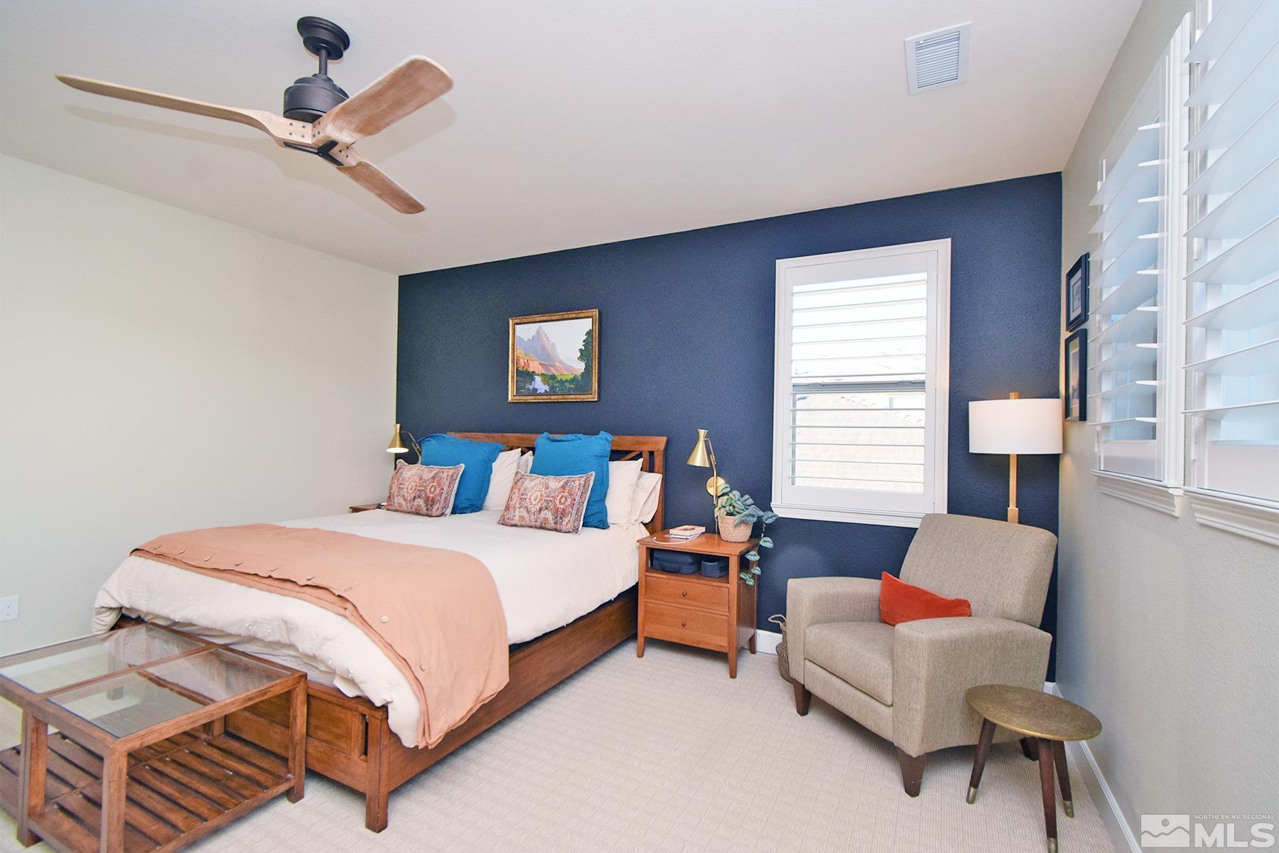 1630 Scott Valley Road Reno, NV 89523 - Photo 17 of 33 a bedroom with a bed couch and window