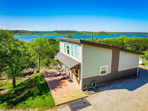 4468 Chapel Road Graham, TX 76450 - Photo 3 of 40 750 sqft Guest House at the Entrance of the Property also with Gorgeous Lake Views.