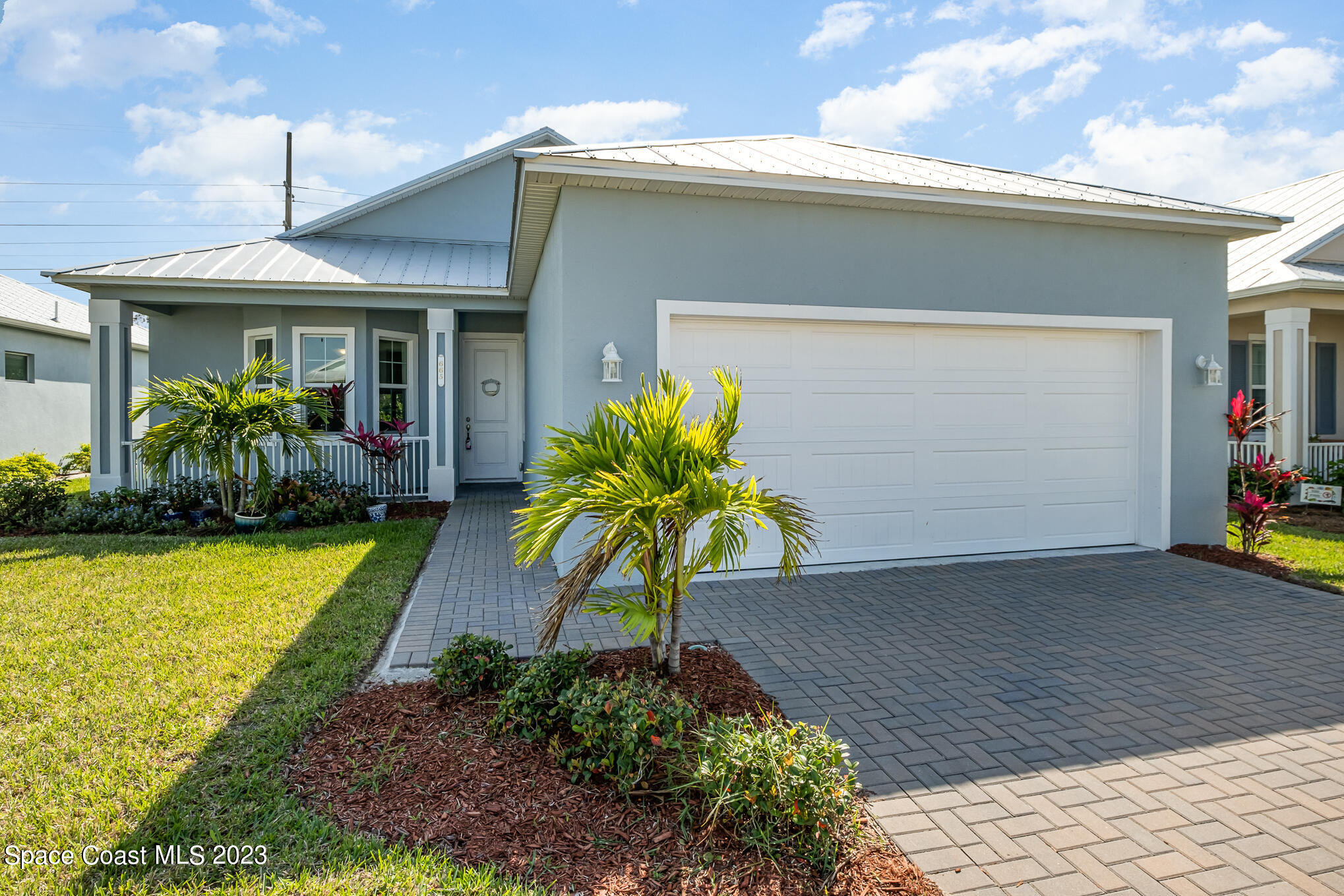 665 Lorelei Avenue Melbourne, FL 32901 - Photo 3 of 32 a front view of house with yard