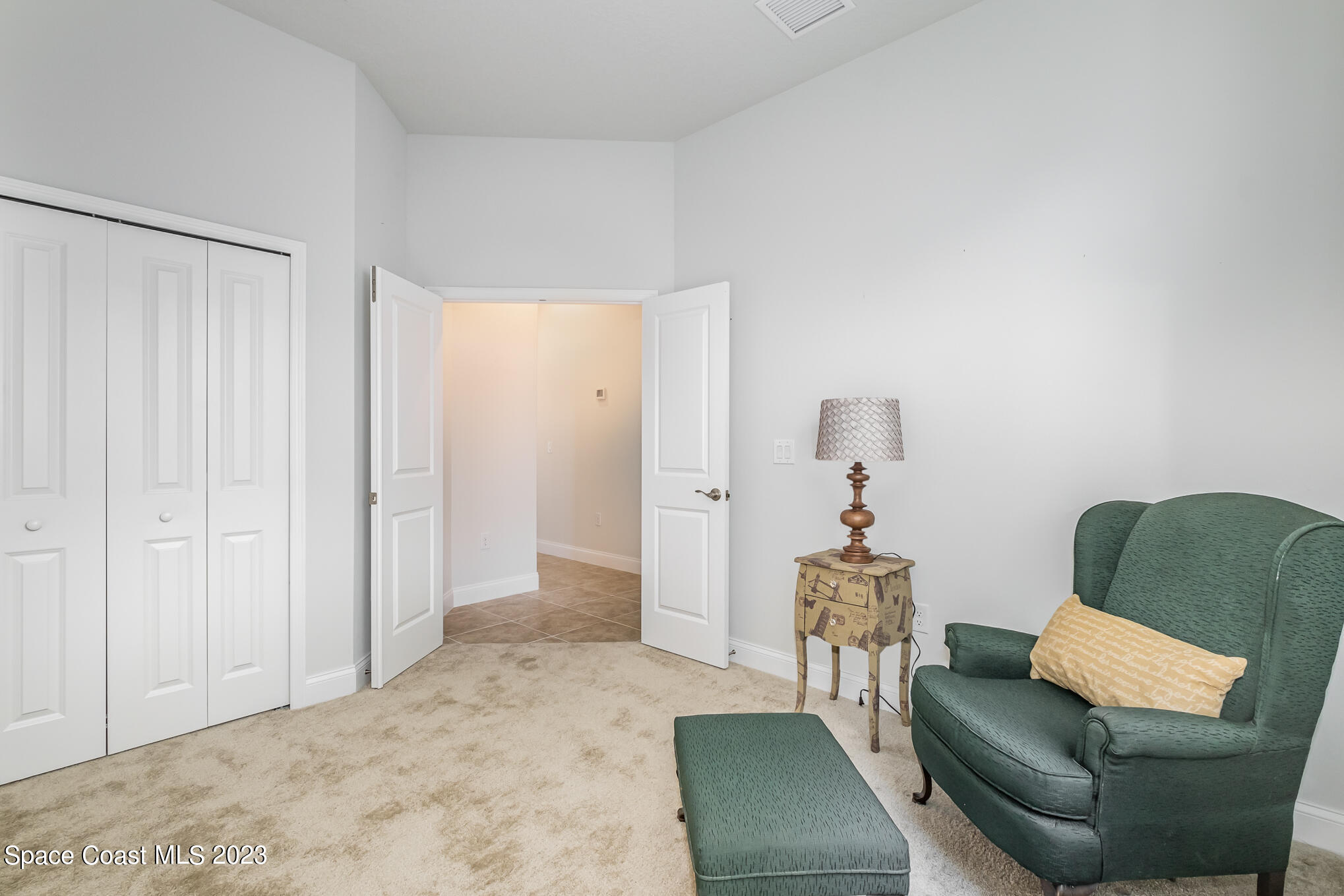665 Lorelei Avenue Melbourne, FL 32901 - Photo 32 of 32 a living room with furniture and a window