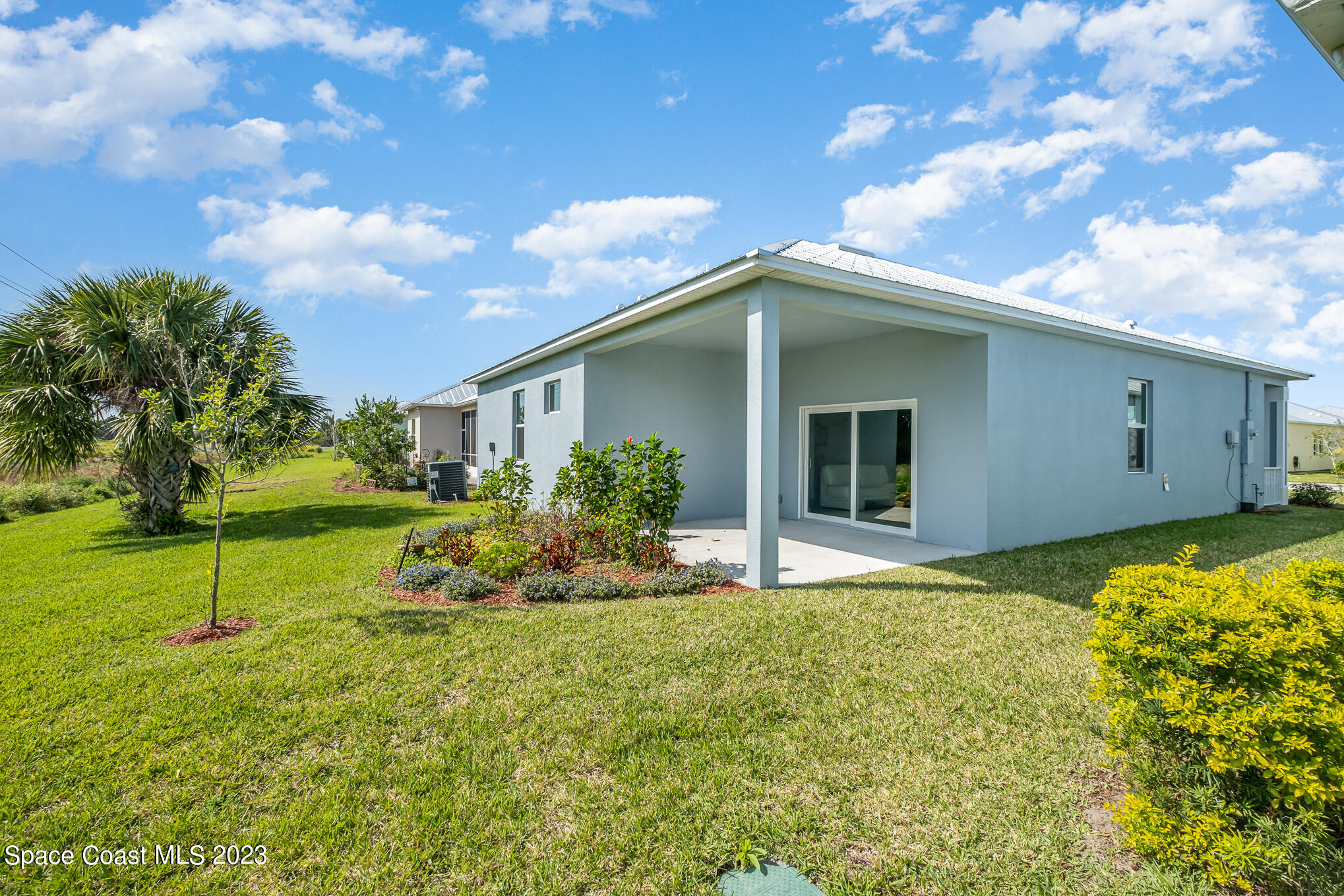665 Lorelei Avenue Melbourne, FL 32901 - Photo 5 of 32 a view of an house with backyard space and garden