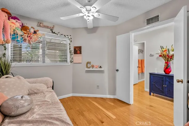 a view of a patio with a table chairs and a patio