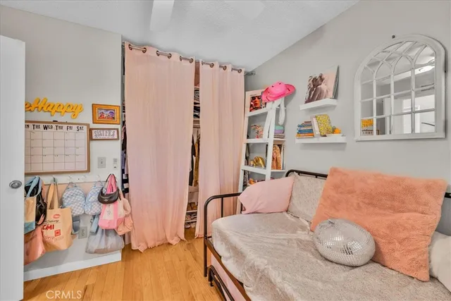 a view of a patio with a table chairs and backyard