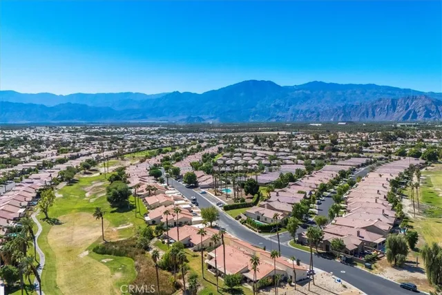 a view of a city with a lake
