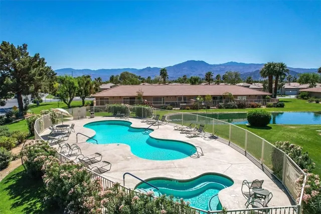 a view of a playground with basketball court