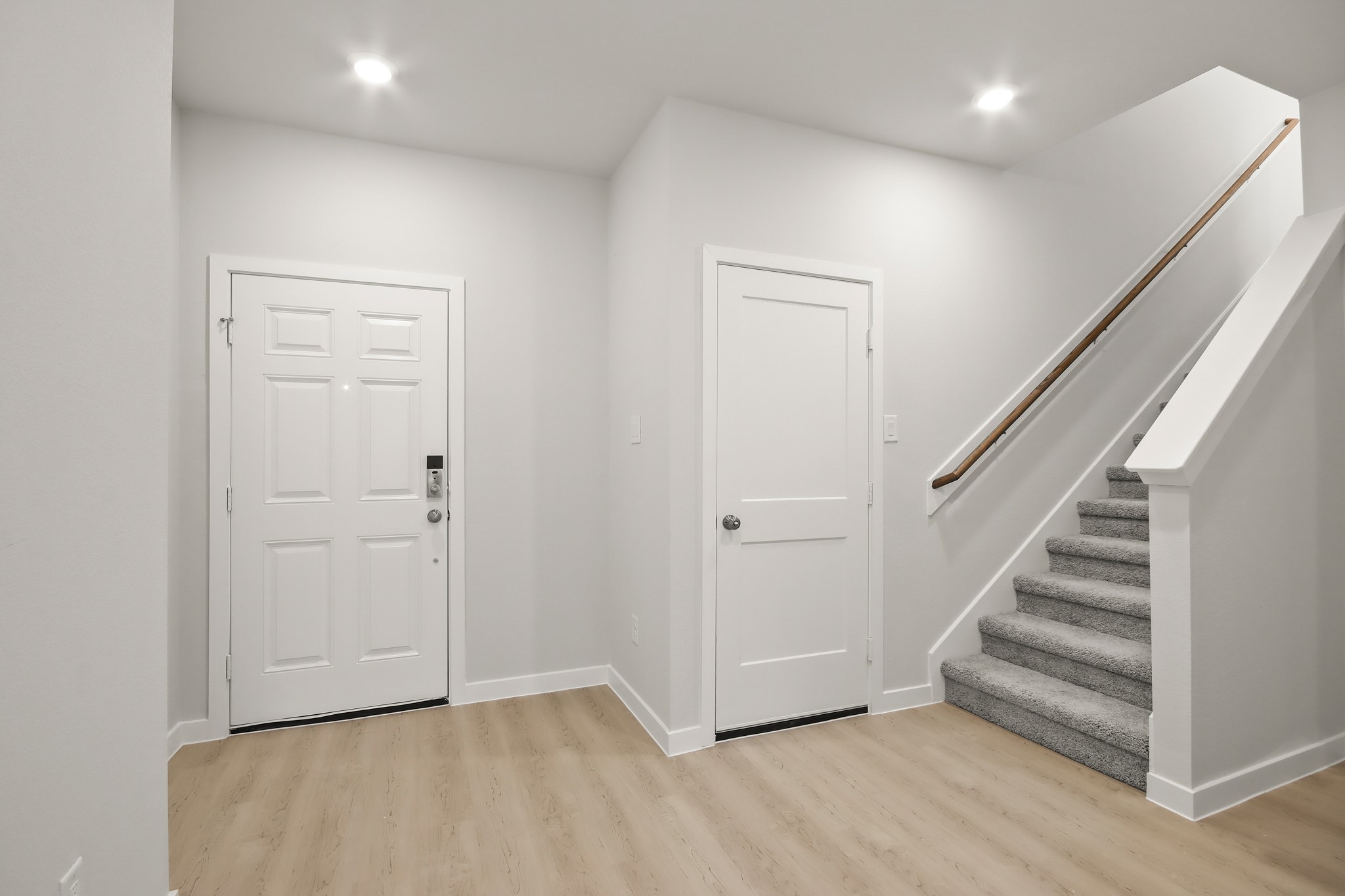 229 Spring Drive Hockley, TX 77447 - Photo 20 of 26 a view of entryway with wooden floor